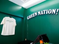Interior of Green Nation Dispensary in Saphan Sung, Bangkok, showing a glowing 
