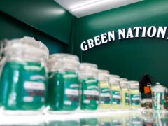 Green Nation Dispensary interior in Bangkok, jars of cannabis products.