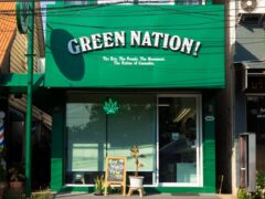 Exterior of Green Nation Dispensary in Saphan Sung, Bangkok, cannabis shop front with cannabis leaf symbol and sign.