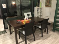 Interior lounge area at Green Nation Dispensary in Saphan Sung, Bangkok, with table, games.