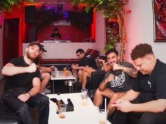 Interior of BJ's BUDSHACK on Walking Street, Pattaya, Thailand, with customers enjoying drinks. Cannabis-friendly vibes.