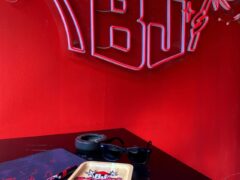 BJ's BUDSHACK, Walking Street, Pattaya with weed accessories, cannabis flower, and neon sign.