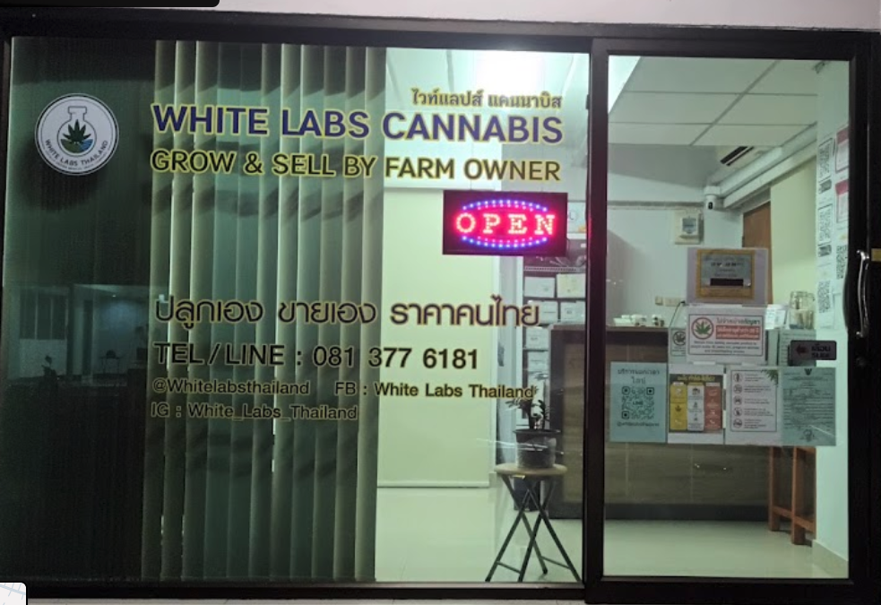 The front of White Labs Cannabis shop with an open sign.
