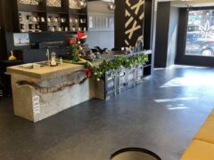 EXTIX cannabis dispensary interior, Choeng Thale, Phuket, Thailand. Modern design, cannabis products on display.